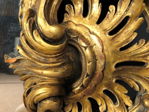 Lot 36 - A carved rococo style giltwood mirror, 19th century