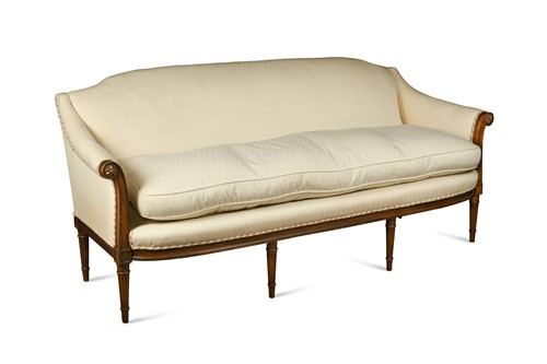 Lot 127 - A Louis XVI style walnut framed sofa