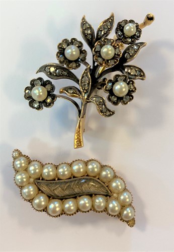 Lot 44 - A diamond and pearl flower brooch and an unusual shaped mourning brooch