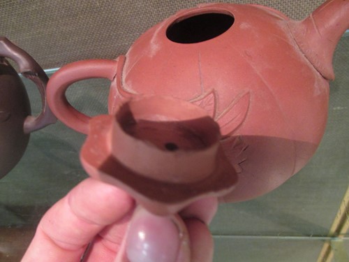 Lot 152 - Three Chinese yixing type teapots, another of...