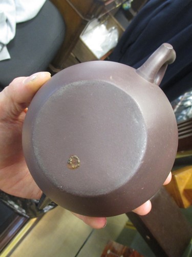 Lot 152 - Three Chinese yixing type teapots, another of...
