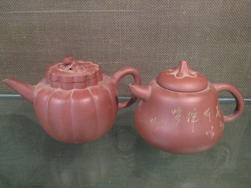 Lot 152 - Three Chinese yixing type teapots, another of...