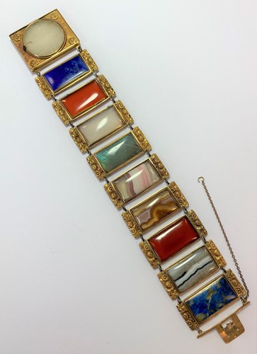 Lot 6 - A bracelet of hardstone plaques