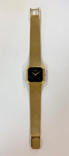 Lot 325 - Baume & Mercier - A gentleman's 18ct gold wristwatch