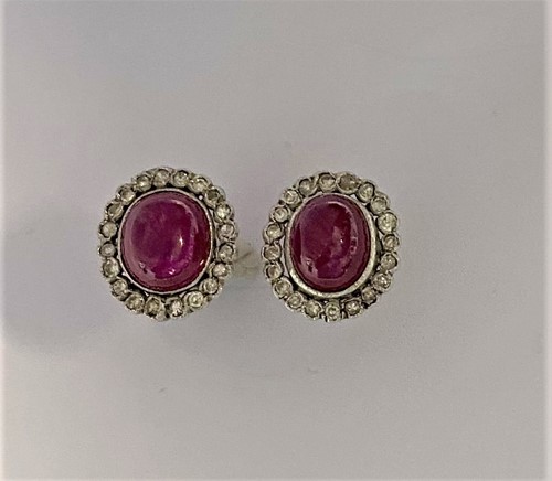 Lot 109 - A pair of ruby and diamond earstuds