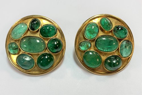 Lot 167 - A pair of cabochon emerald disc earstuds