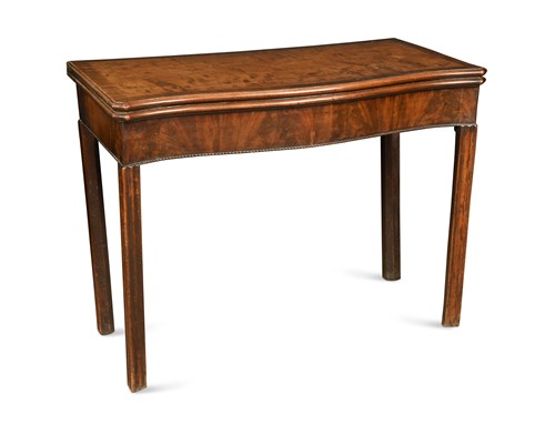 Lot 94 - An early George III mahogany serpentine concertina action card table