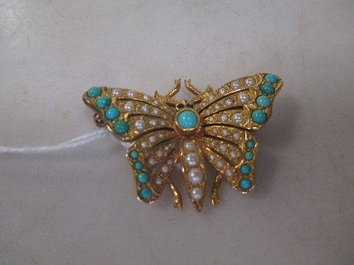 Lot 260 - Turquoise, pearl and garnet butterfly brooch,...