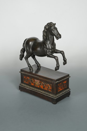 Lot 141 - A bronze model of a prancing horse, probably 18th century