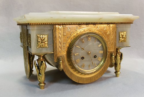 Lot 842 - A French onyx mantel clock, late 19th century