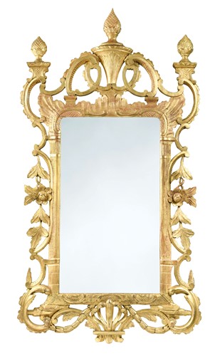Lot 946 - A carved and pierced giltwood wall mirror, 19th century