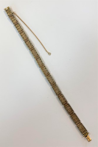 Lot 126 - A modern bi - colour bracelet