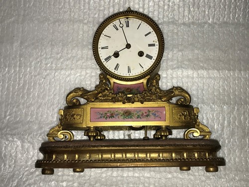 Lot 305 - A French 19th century gilt metal mantel clock