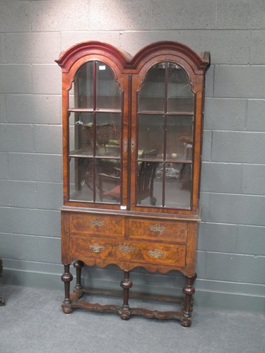 Lot 742 - A Queen Anne style walnut cabinet on stand,...