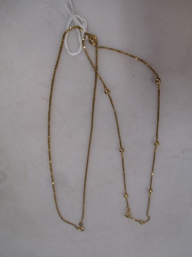 Lot 264 - box chain and ball chain, both stamped '750'...