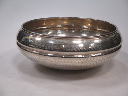 Lot 299 - A silver plated hammered finished bowl, signed...