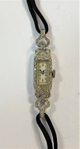 Lot 329 - Unsigned - A lady's diamond set cocktail watch