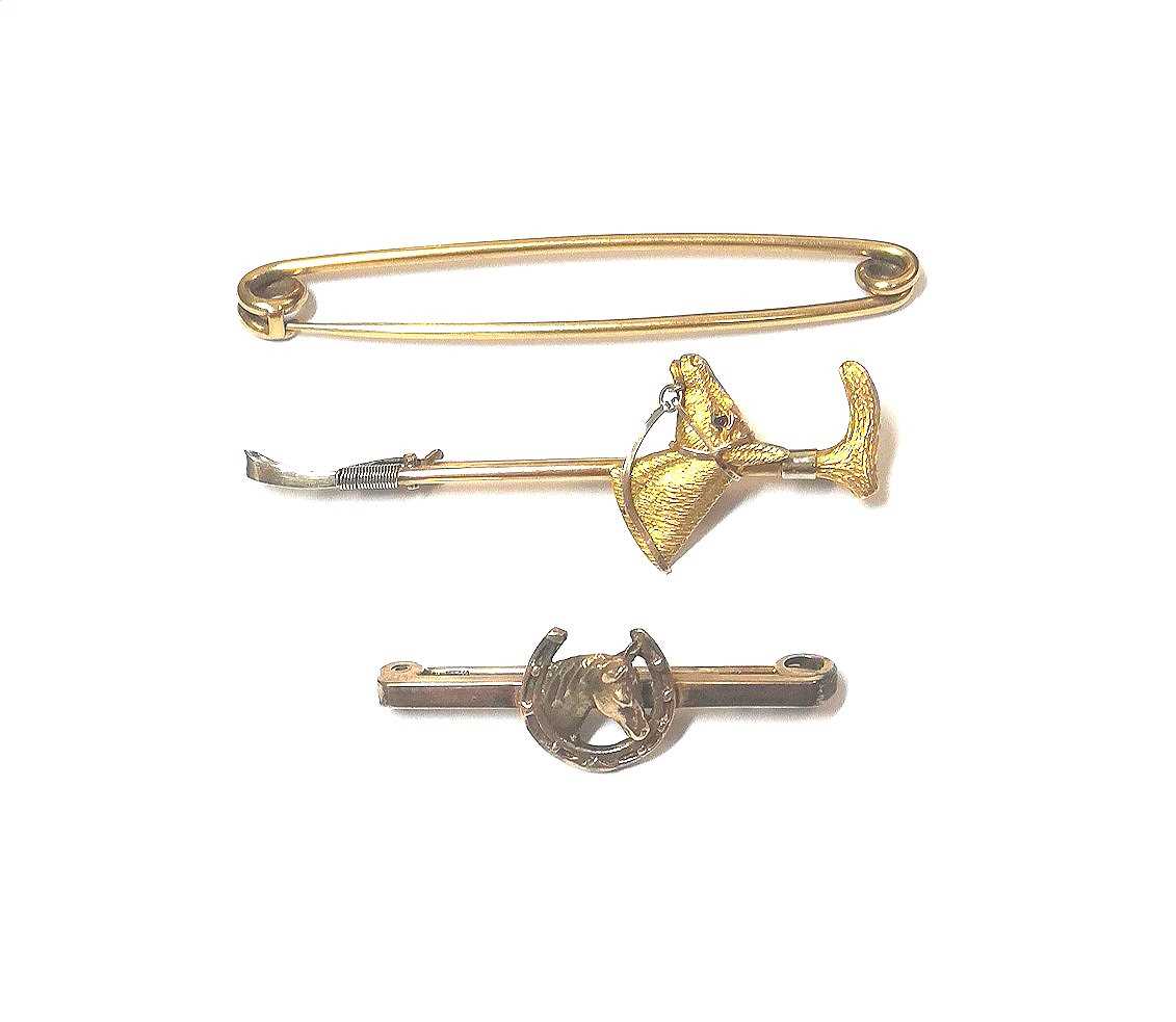 Lot 37 - A trio of equestrian brooches