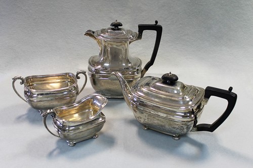 Lot 609 - A George VI silver four piece tea set