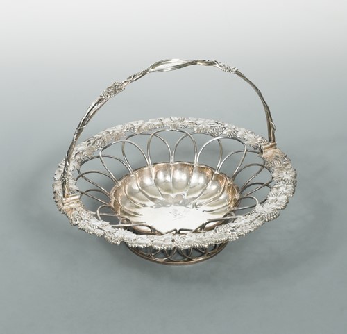 Lot 535 - A George IV silver swing handled fruit basket