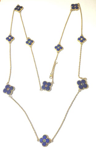 Lot 140 - A chain necklace of lapis lazuli set quatrefoil flowers