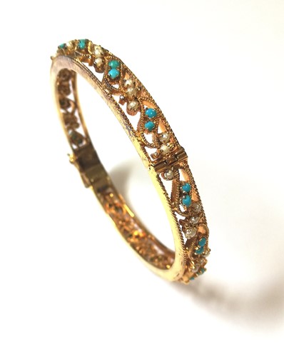 Lot 96 - A turquoise and pearl set filigree bangle