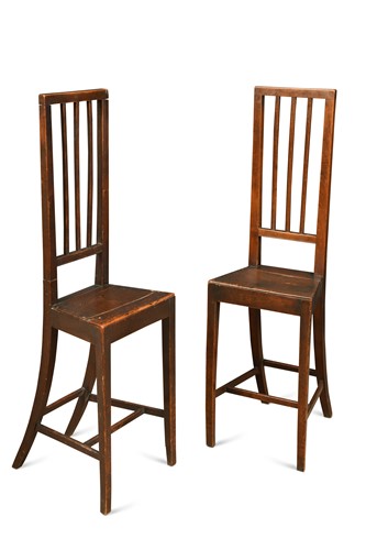 Lot 862 - A pair of fruitwood stick back correction chairs, mid 19th century