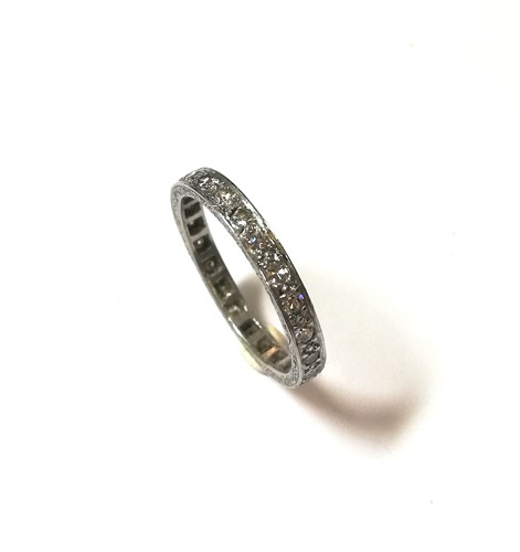 Lot 144 - A diamond set full eternity ring