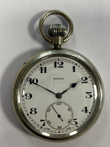 Lot 261 - Rolex – A base metal military issue open-faced pocket watch