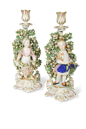 Lot 7 - A pair of Chelsea figural bocage candlesticks