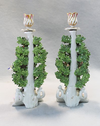 Lot 7 - A pair of Chelsea figural bocage candlesticks