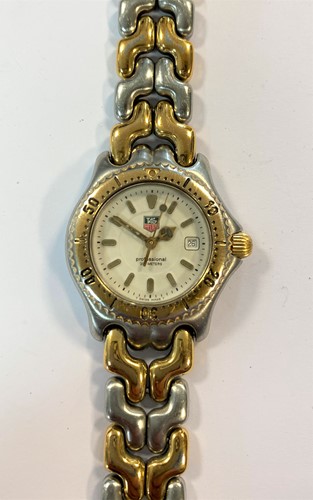 Lot 336 - Tag Heuer - A lady's two-tone 'S/el' wristwatch
