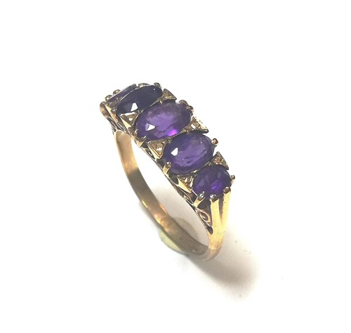 Lot 67 - A modern amethyst carved head style ring