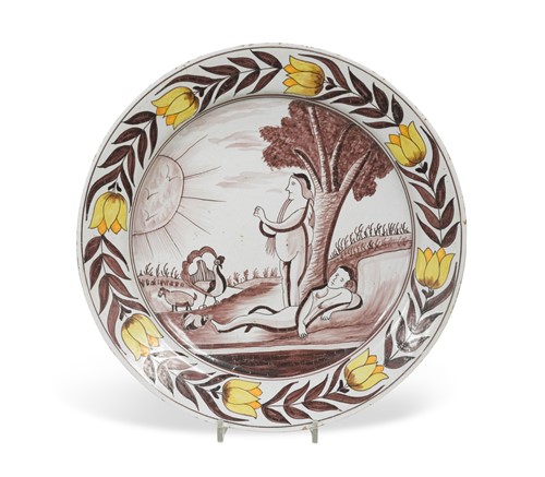 Lot 46 - An 18th century Delft polychrome 'Adam and Eve charger