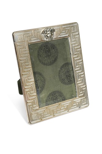 Lot 100 - A Versace un-hallmarked white metal photograph frame