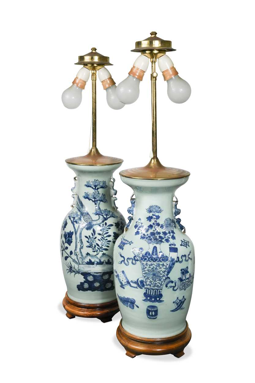 Lot 953 - A pair of  Chinese blue and white lamps, 20th century