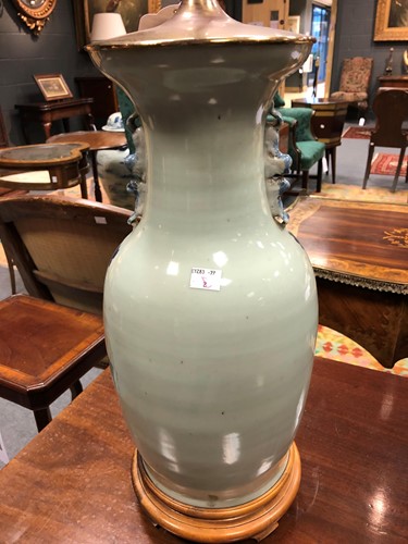 Lot 953 - A pair of  Chinese blue and white lamps, 20th century