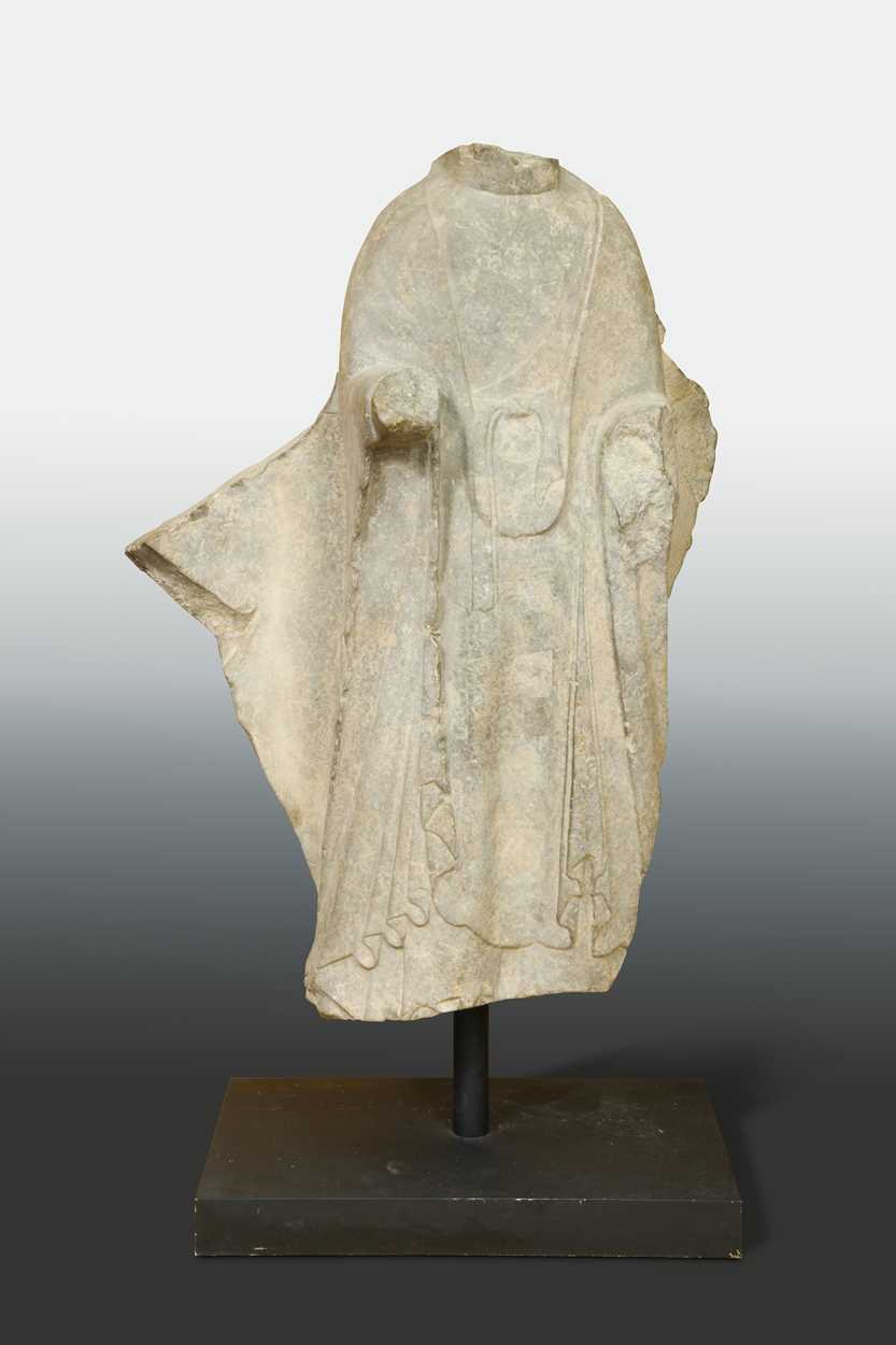 Lot 158 - A limestone Buddha, perhaps Northern Wei,...
