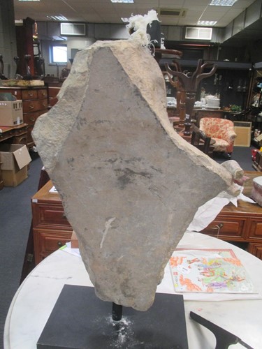 Lot 158 - A limestone Buddha, perhaps Northern Wei,...