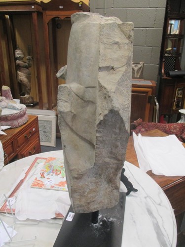 Lot 158 - A limestone Buddha, perhaps Northern Wei,...