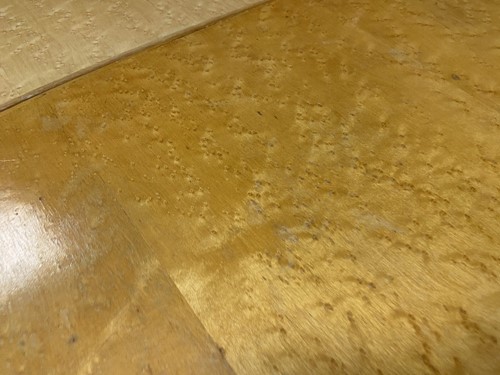 Lot 168 - An Art Deco birdseye-maple draw-leaf dining table