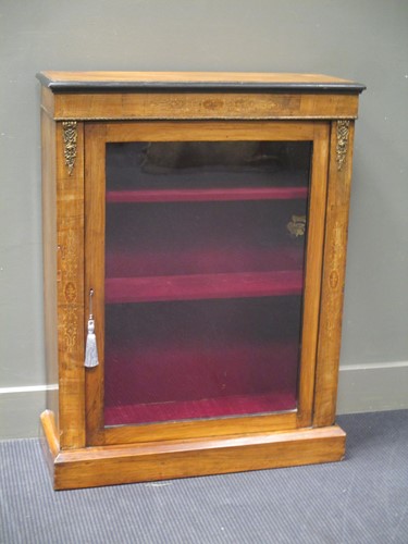 Lot 612 - A Victorian inlaid walnut pier cabinet on...