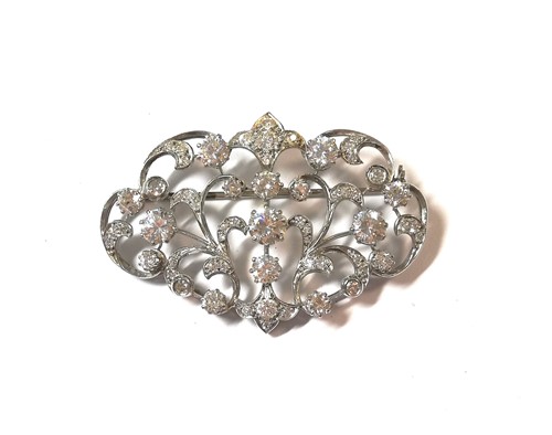 Lot 11 - An Edwardian style diamond and cubic zirconia brooch