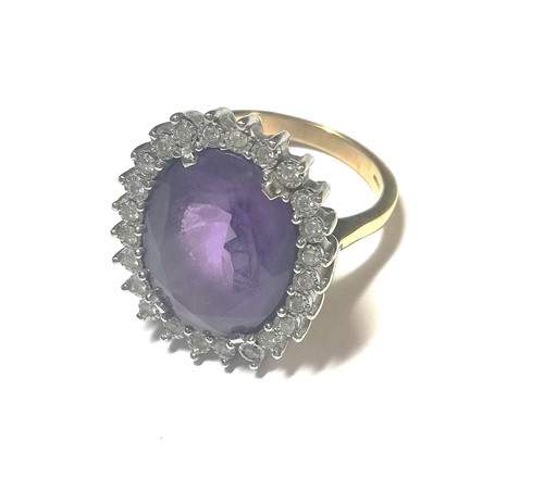 Lot 61 - A large amethyst and diamond cluster ring