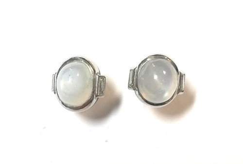 Lot 12 - A pair of star sapphire and diamond earstuds