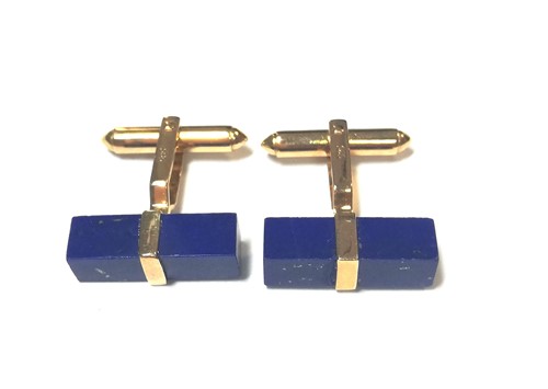 Lot 10 - A pair of modern cufflinks set with lapis lazuli