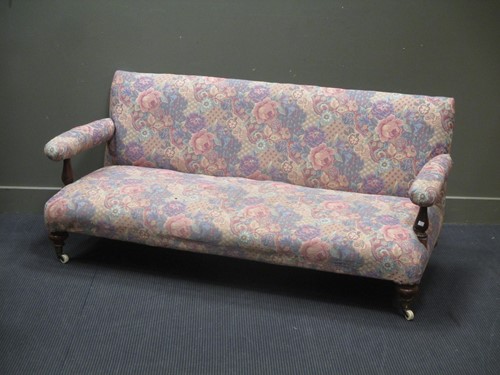 Lot 648 - A Victorian sofa on turned legs and casters 170cm