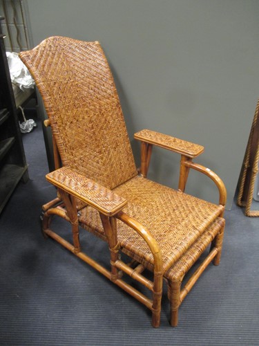 Lot 608 - An adjustable rattan armchair