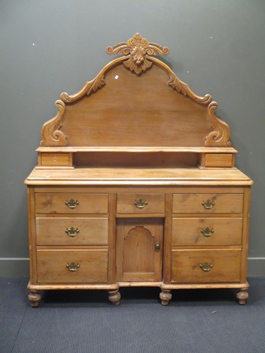 Lot 721 - A Lincolnshire pine dresser with raised arched...