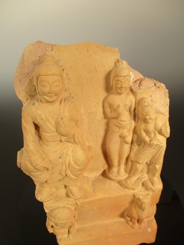 Lot 199 - A Chinese pottery fragmentary architectural tile, perhaps Tang Dynasty